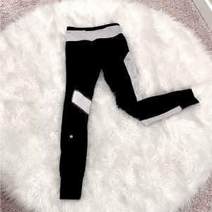 NEVER WORN. Size 2 Lululemon Running Pants.